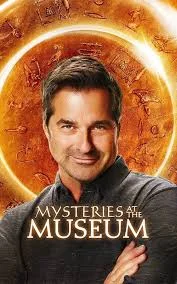 Don Wildman poses slyly in front of a circular background, text appears in front of him which reads